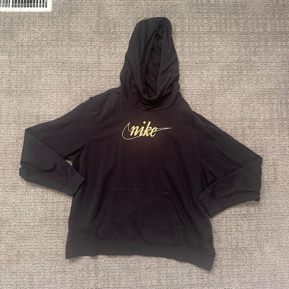 Women’s black and gold Nike hoodie
